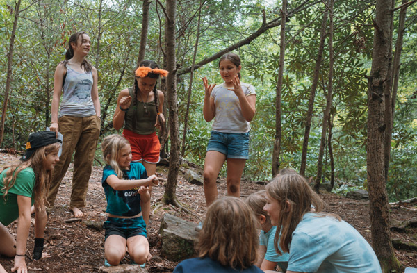 Kids working out a scene idea at Forest Floor's summer theater camp