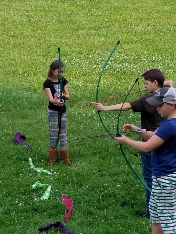 Young archers training at Asheville area summer camp